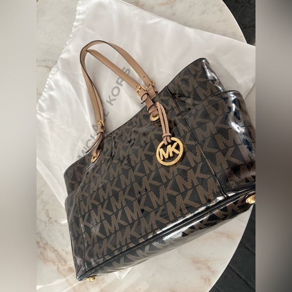 Michael Kors Black and Tan Signature Backpack - Picture 8 of 15